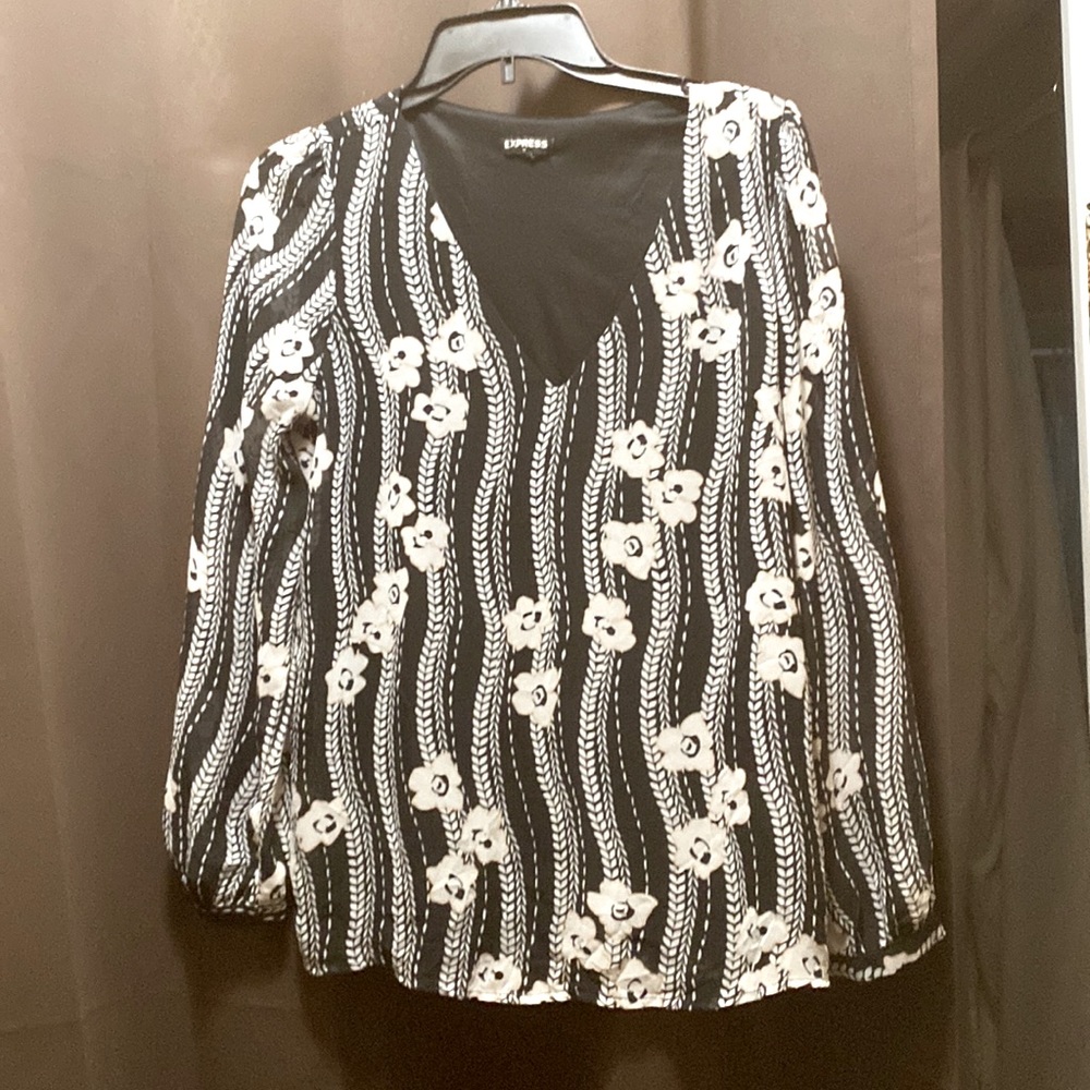 Sheer black and white blouse with an under slip